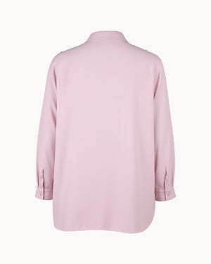 Pink shirt on a white background