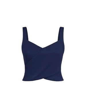 Navy blue top with a V-neck and thin straps on a white background