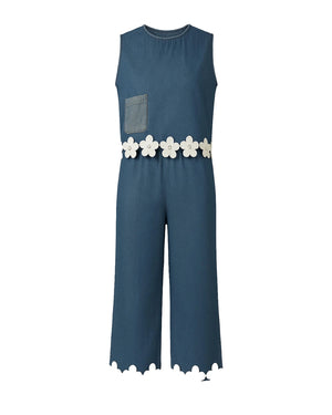 Blue jumpsuit with floral details on a white background