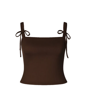 Brown ribbed tank top with thin straps and tied ends on a white background