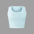Light blue crop top with a textured pattern on a gray background