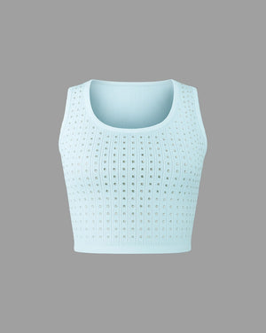 Light blue crop top with a textured pattern on a gray background