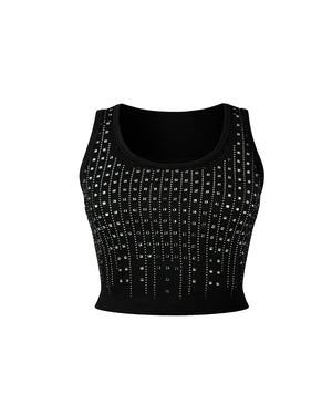 Black crop top with decorative patterns on a white background