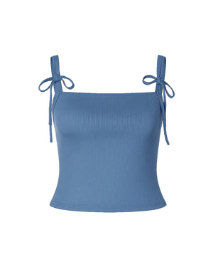Blue ribbed crop top with thin straps on a white background