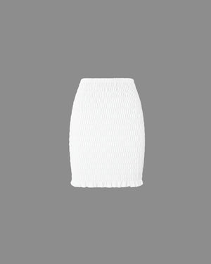 White skirt on a gray background