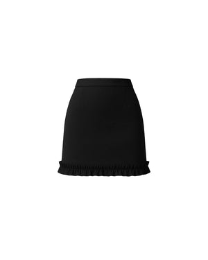 Black mini skirt with ruffled hem on a white background