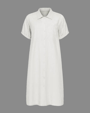 White dress with short sleeves on a gray background