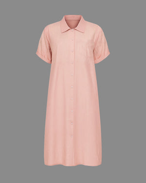 Pink shirt dress on a gray background