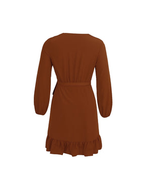 Brown dress with long sleeves and ruffled hem on a white background