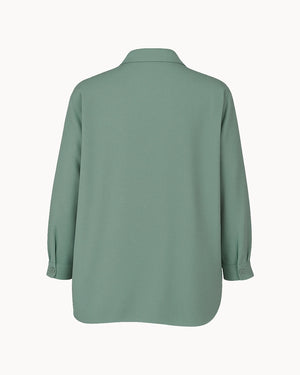 Green shirt on a white background