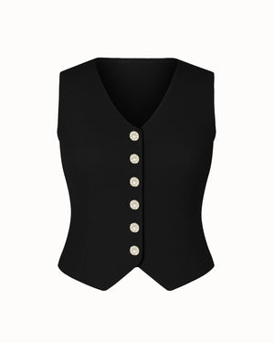 Black vest with silver buttons on a white background