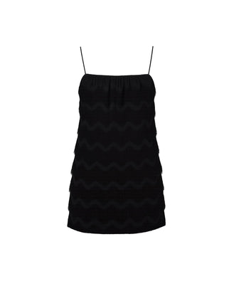 Black zigzag patterned dress on a white background