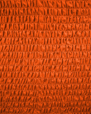 Close-up of orange textured fabric