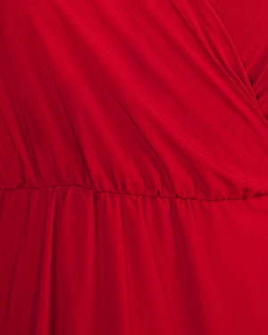 BeboNLolo red wrap dress close-up showing V-neckline and ruffle fabric detail – Close-Up View