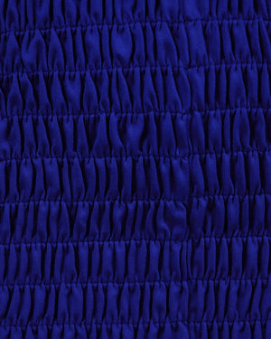 Close-up of blue fabric with a textured pattern