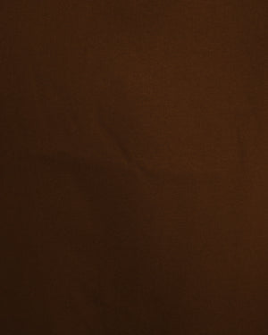 BeboNLolo rust wrap dress close-up showing V-neckline and ruffle fabric detail – Close-Up View