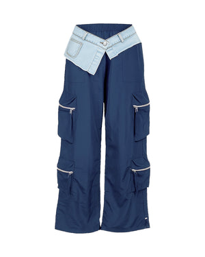 Blue cargo pants with a light blue waistband on a white background