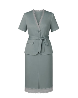 Green dress with lace details on a white background