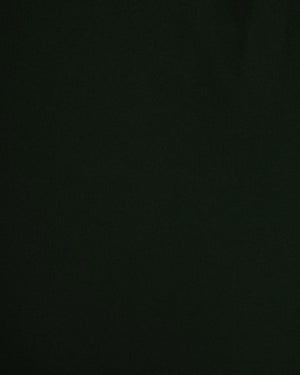 BeboNLolo green wrap dress close-up showing V-neckline and ruffle fabric detail – Close-Up View