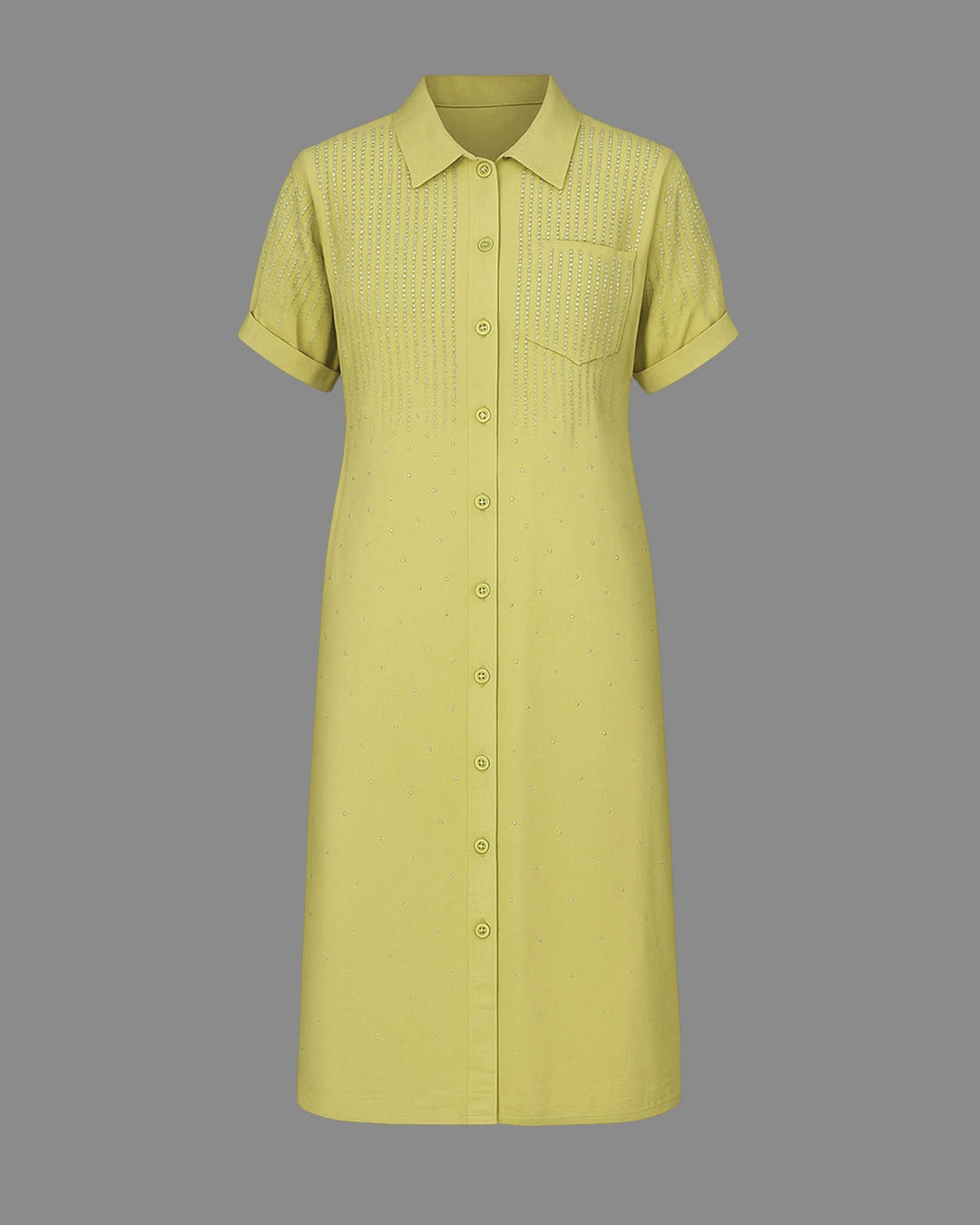 Green dress with short sleeves on a gray background