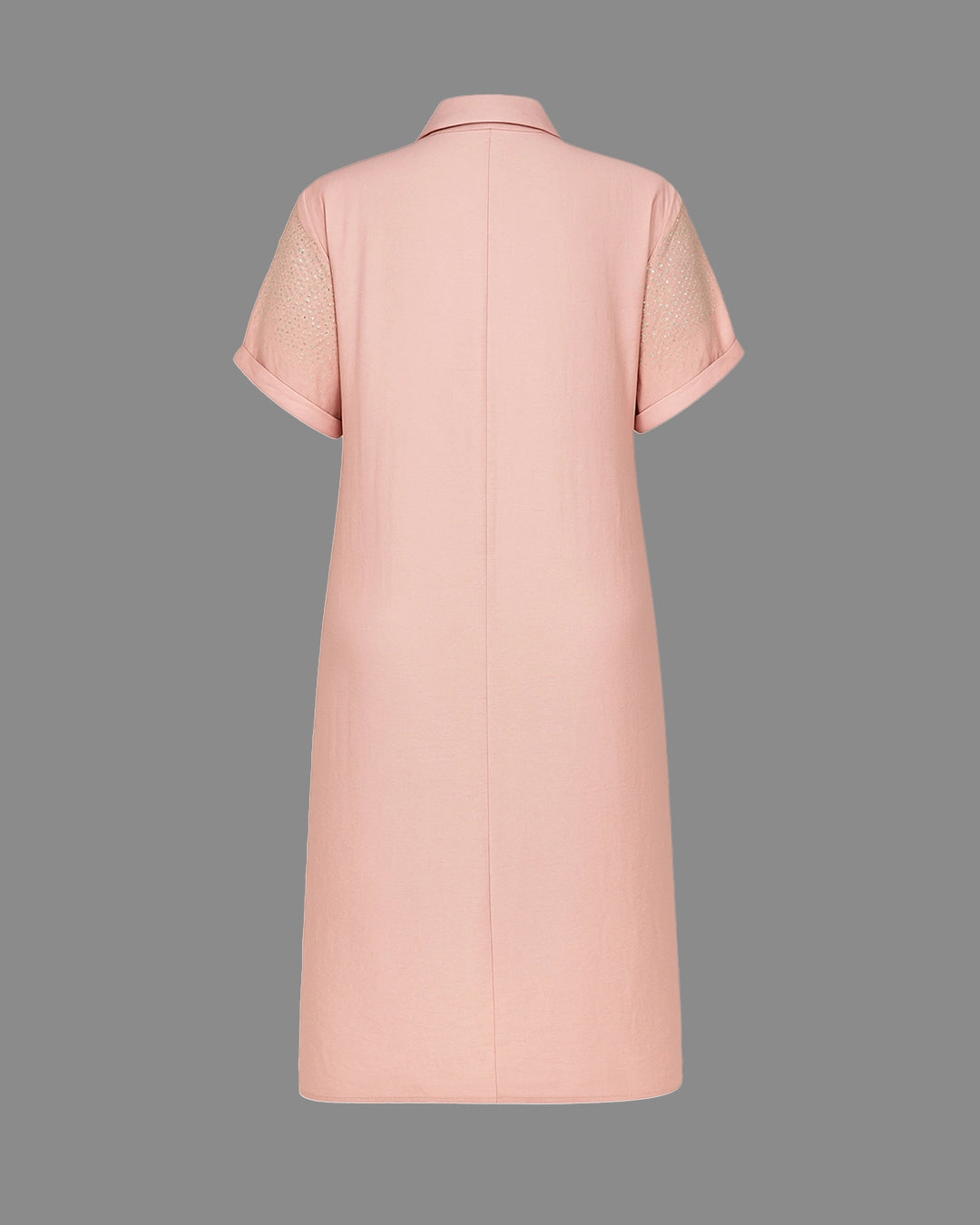 Pink dress with short sleeves on a gray background