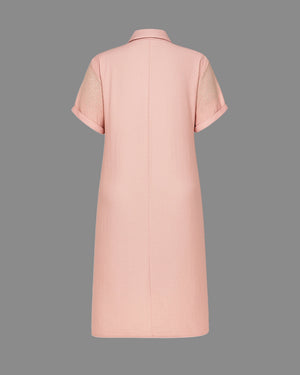 Pink dress with short sleeves on a gray background