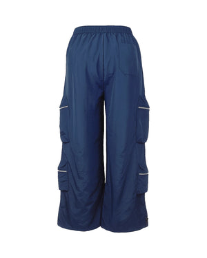 Blue cargo pants with multiple pockets on a white background