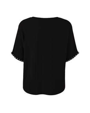 Black blouse with short sleeves on a white background