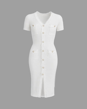 White dress with button details on a gray background