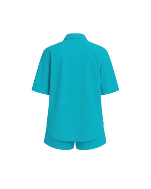 Turquoise shirt and shorts set on a white background