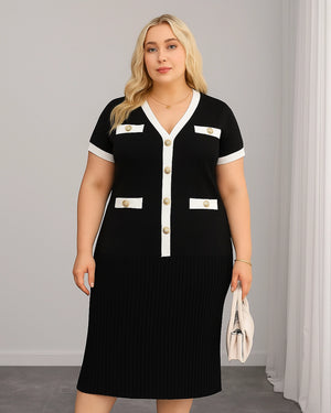 Woman wearing a black dress with white accents and gold buttons against a gray background