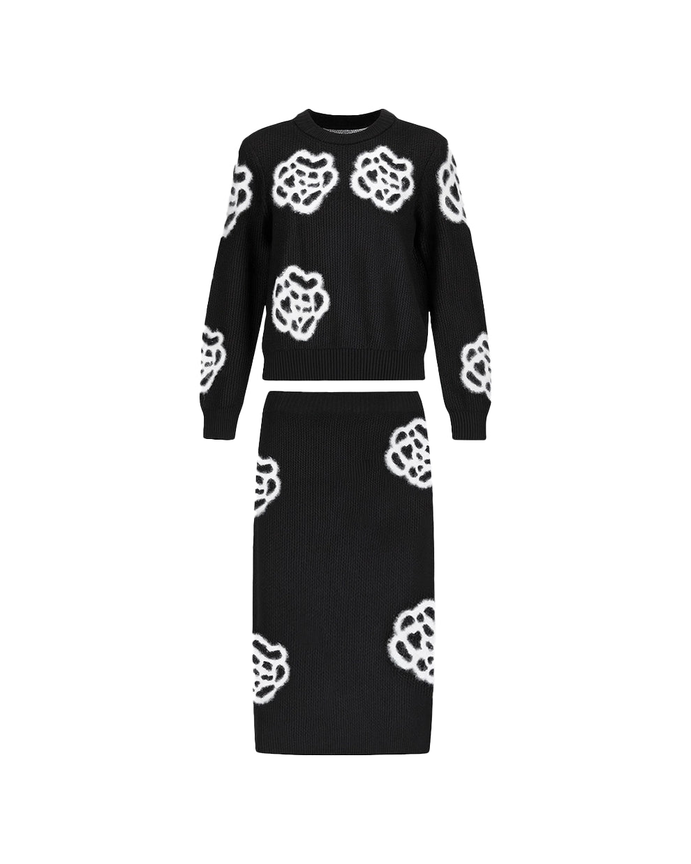 Black sweater and skirt set with white floral patterns on a white background