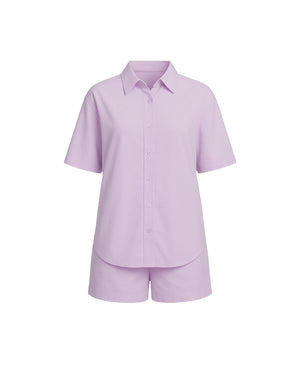 Lavender shirt and shorts set on a white background
