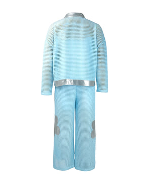 Light blue jumpsuit with silver accents on a white background