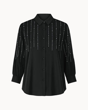 Black shirt with decorative elements on a white background