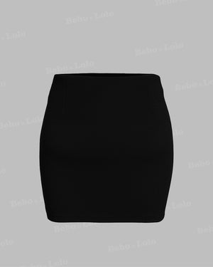 Black mini skirt on a light gray background