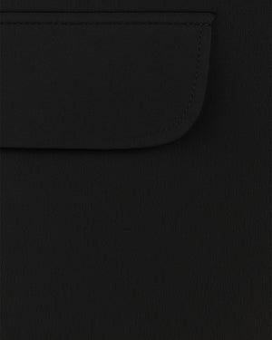 Close-up of a black pocket on a dark fabric background