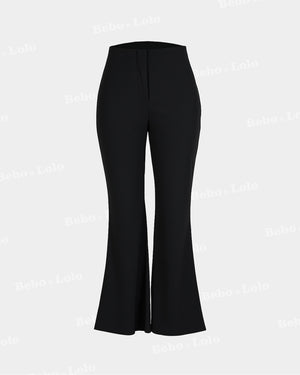Black flared pants on a light gray background