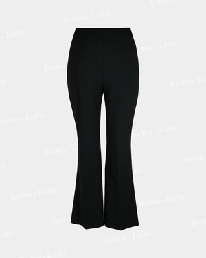 Black flared pants on a light gray background