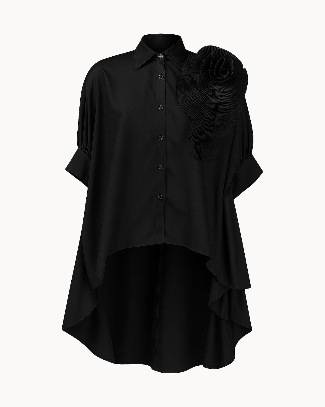 Black shirt with ruffled shoulder on a white background