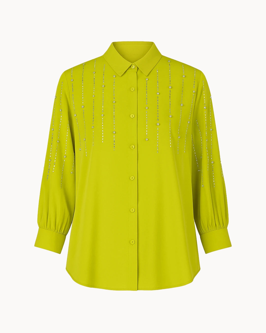 Yellow blouse with decorative elements on a white background