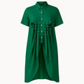 Green dress with a belt on a white background