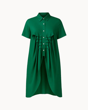 Green dress with a belt on a white background