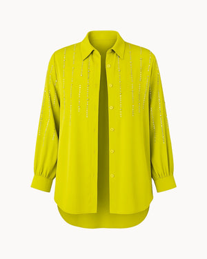 Yellow shirt with subtle pattern on a white background