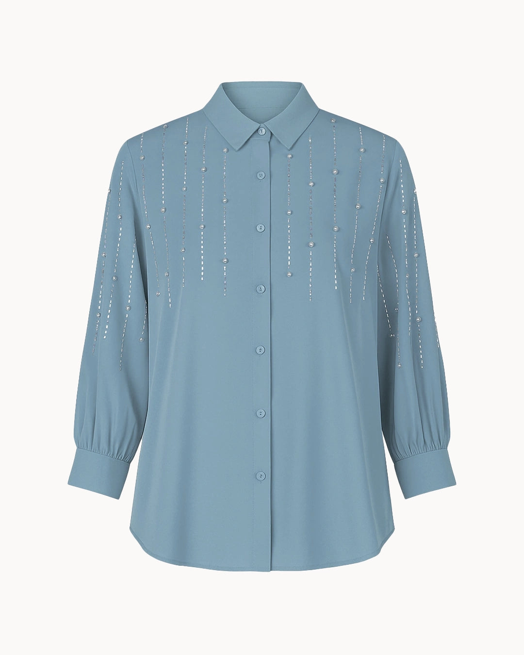 Light blue shirt with decorative elements on a white background