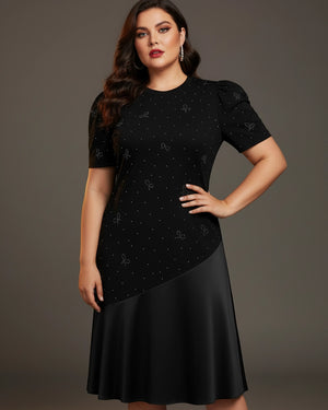 Woman wearing a black dress with a star pattern on a gray background