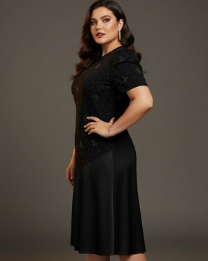 Woman wearing a black dress with a star pattern on a gray background
