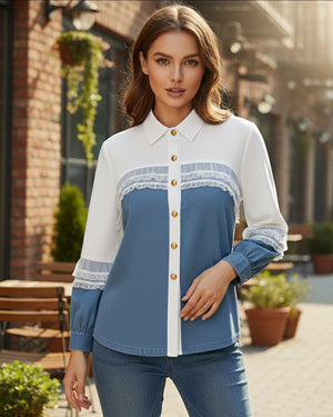 Woman wearing a white and blue striped shirt with gold buttons outdoors.