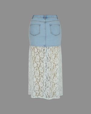 Skirt with denim top and lace bottom on a gray background