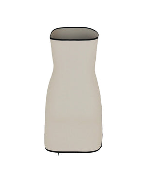 Beige strapless dress with black trim on a white background